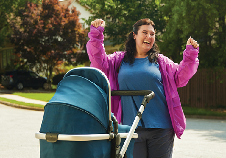 Woman pushing stroller